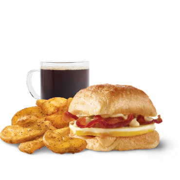 Wendy’s Breakfast Menu 2026 – Prices, Calories & Deals 3 Bacon, Egg & Swiss Croissant Combo at Wendy's Breakfast.