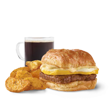 Wendy’s Breakfast Menu 2026 – Prices, Calories & Deals 2 Sausage, Egg & Swiss Croissant Combo at Wendy's Breakfast.